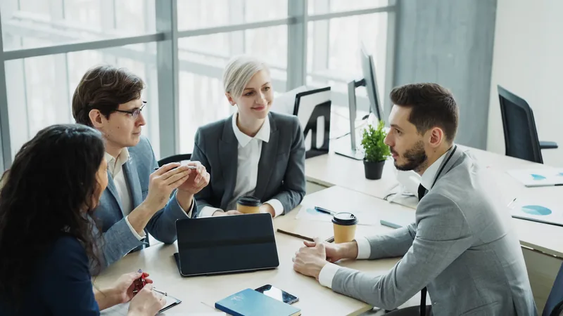 Diverse business team collaborating in a modern office