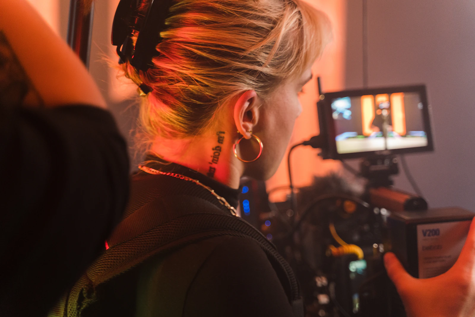 A camera operator preparing a video recording